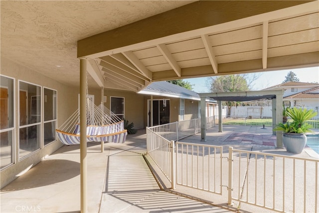 view of patio with fence