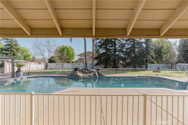 view of pool featuring a fenced in pool, a patio, and a fenced backyard