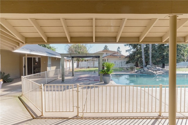 view of swimming pool with fence, a patio area, and a fenced in pool