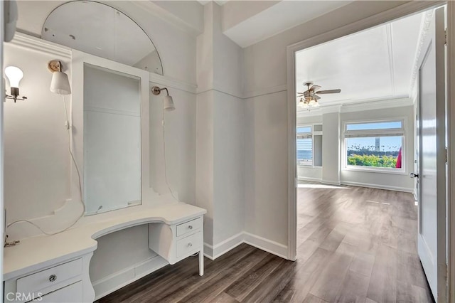 mudroom with baseboards, a ceiling fan, and dark wood-style flooring