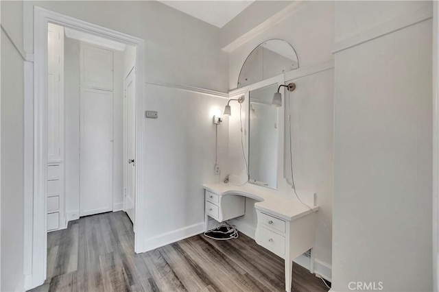 1030 E Ocean Blvd Unit 110, Long Beach, CA 90802 - bathroom featuring vanity, baseboards, and wood finished floors