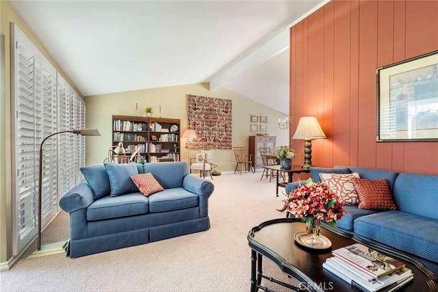 carpeted living area featuring lofted ceiling with beams