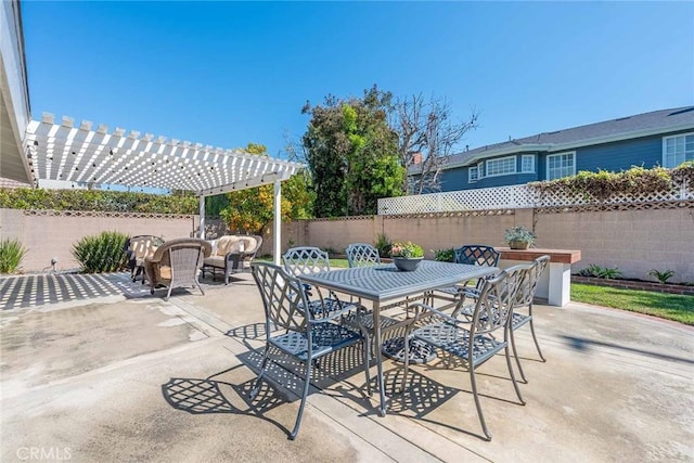 view of patio / terrace featuring a pergola, outdoor dining area, and a fenced backyard