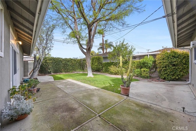 view of patio with a fenced backyard