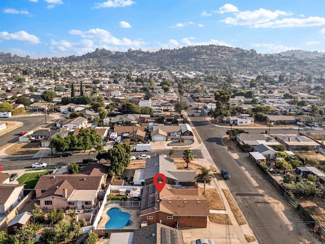 bird's eye view featuring a mountain view and a residential view