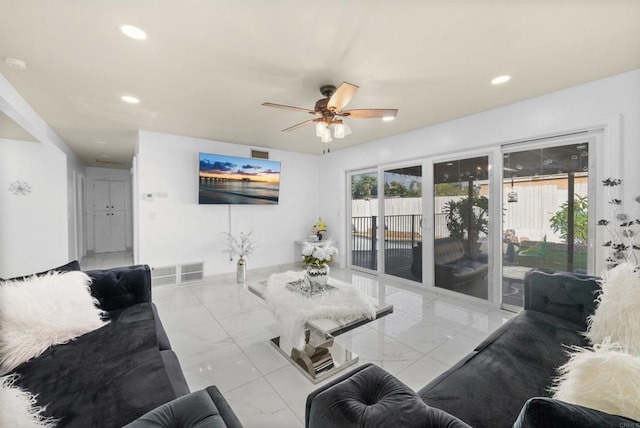 living area featuring visible vents, recessed lighting, and ceiling fan