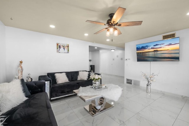 living room featuring visible vents, recessed lighting, marble finish floor, and ceiling fan