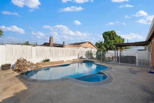 view of pool with a patio area, a fenced in pool, and a fenced backyard