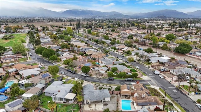 bird's eye view with a residential view and a mountain view