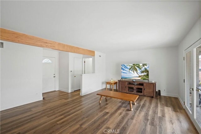 living room featuring plenty of natural light and wood finished floors