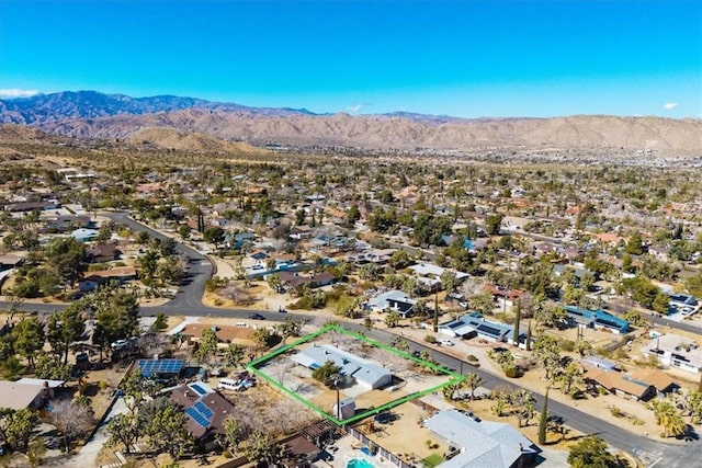 drone / aerial view with a mountain view and a residential view