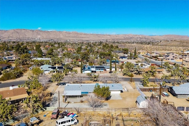 aerial view with view of desert and a mountain view