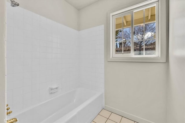 full bath with tile patterned floors, baseboards, and shower / bath combination