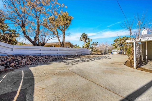 exterior space featuring concrete driveway