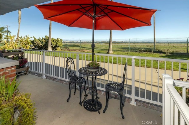 view of patio / terrace featuring a rural view