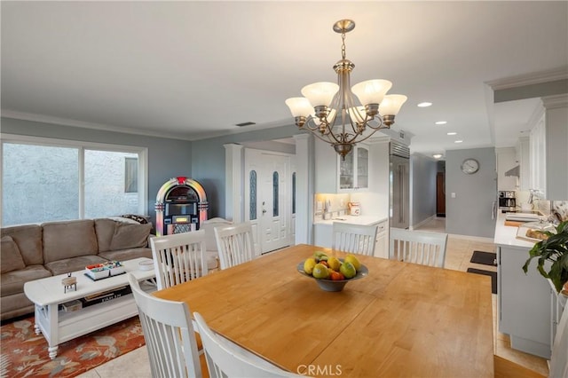 dining space with visible vents, ornamental molding, recessed lighting, an inviting chandelier, and light tile patterned flooring