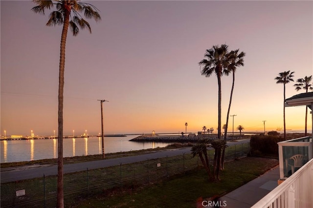 water view featuring fence