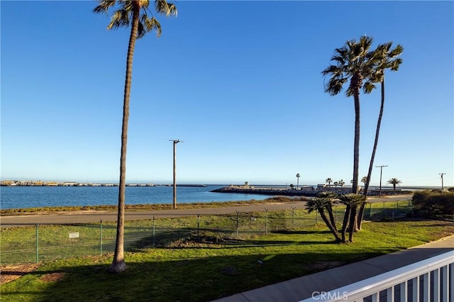 water view featuring fence