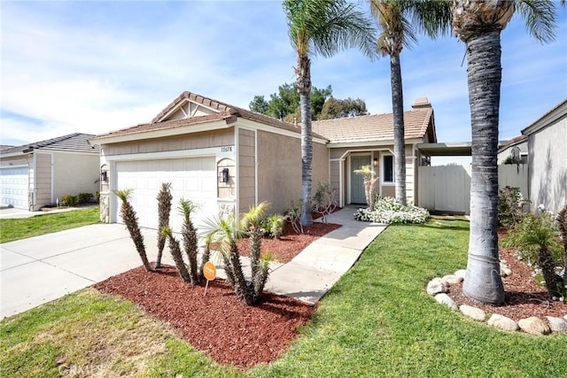 view of front facade with an attached garage, stucco siding, a chimney, a front lawn, and concrete driveway