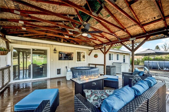 view of patio / terrace featuring an outdoor living space, cooling unit, and a deck