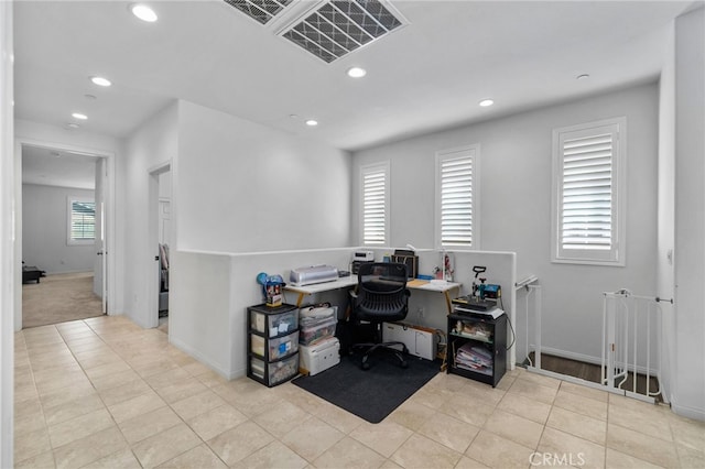 tiled office space featuring recessed lighting, visible vents, and baseboards