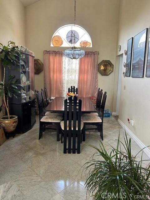 30103 Desert Rose Dr, Castaic, CA 91384 - dining space with a chandelier and a high ceiling