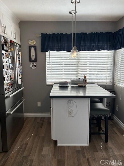 30103 Desert Rose Dr, Castaic, CA 91384 - dining room featuring dark wood-type flooring