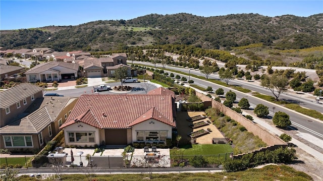 bird's eye view featuring a residential view and a mountain view