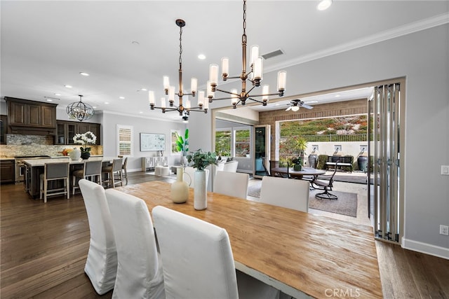 dining space featuring visible vents, ornamental molding, recessed lighting, a ceiling fan, and dark wood-style flooring