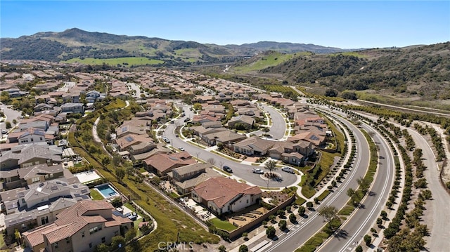 bird's eye view featuring a mountain view and a residential view