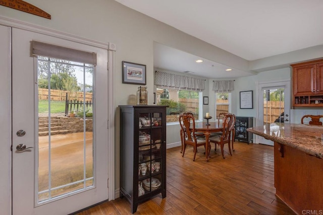 dining area featuring recessed lighting and wood finished floors