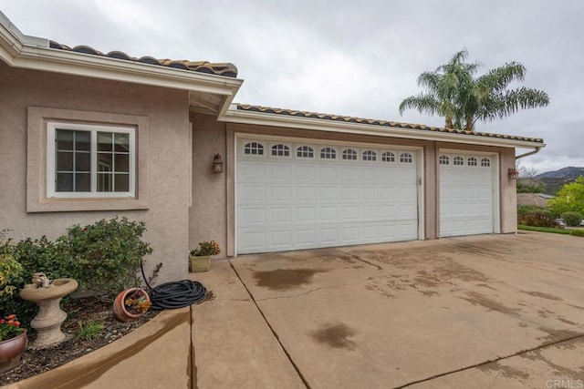 garage with driveway