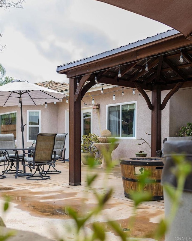 view of patio featuring a gazebo