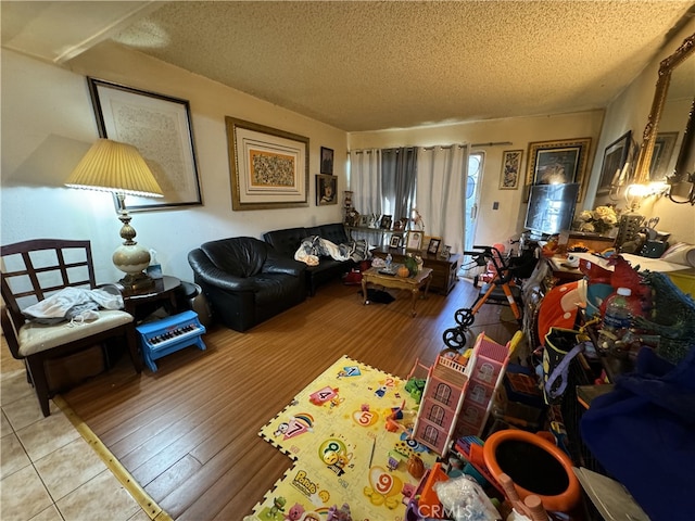 18620 Hatteras St Unit 166, Tarzana, CA 91356 - living area with wood finished floors and a textured ceiling