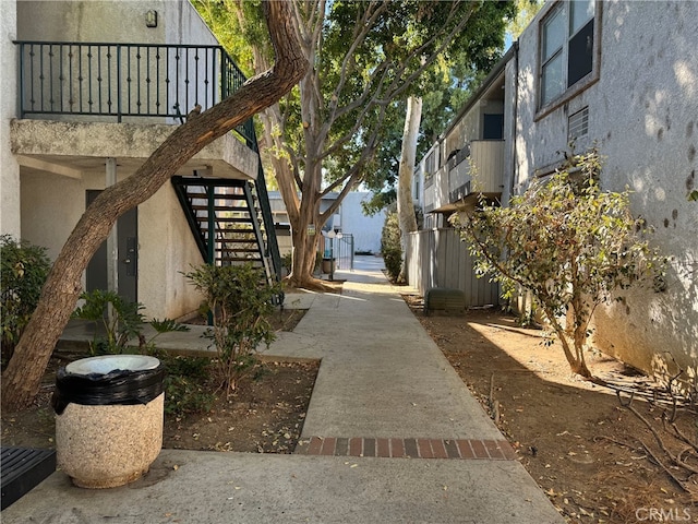 view of community featuring stairway