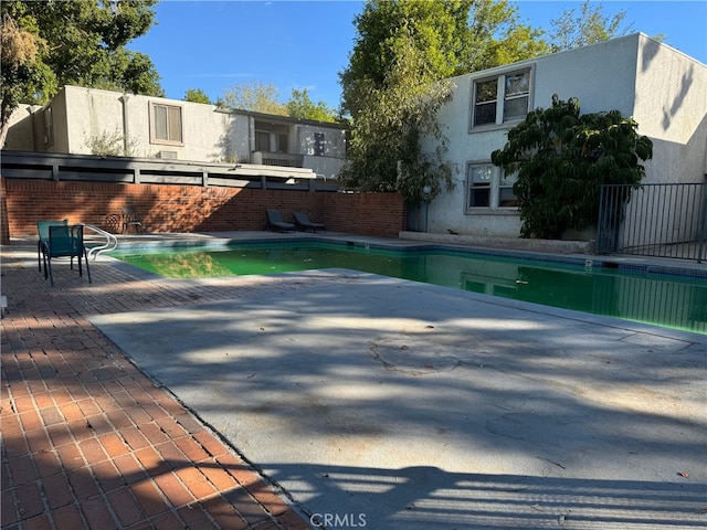 18620 Hatteras St Unit 166, Tarzana, CA 91356 - view of swimming pool featuring a patio and a fenced in pool