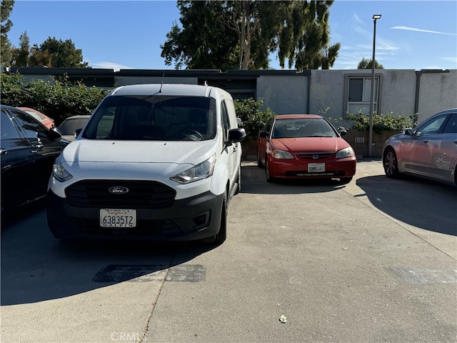 view of uncovered parking lot