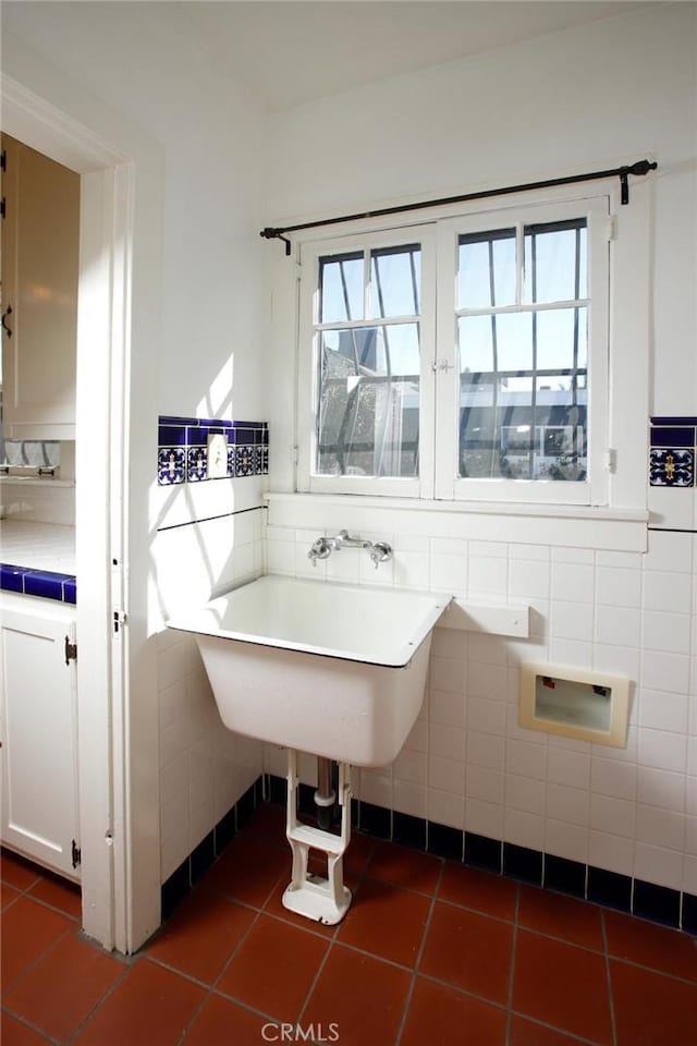 bathroom featuring tile walls and tile patterned flooring