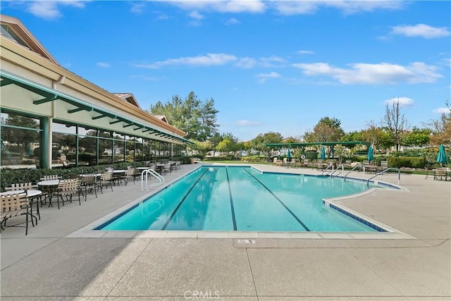 pool featuring a patio