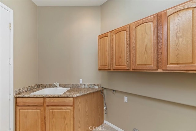 interior space featuring light countertops and a sink