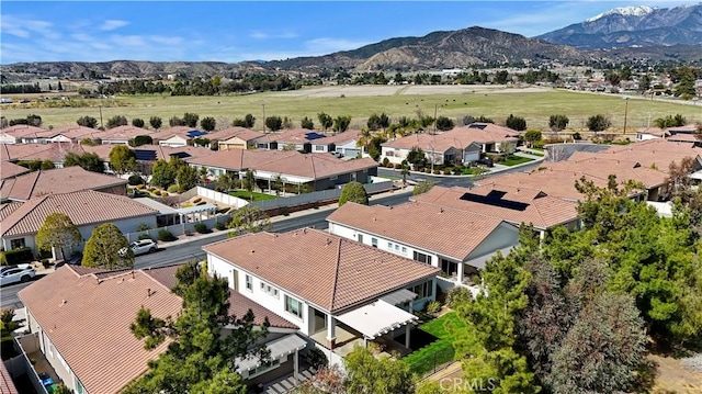 birds eye view of property featuring a residential view and a mountain view