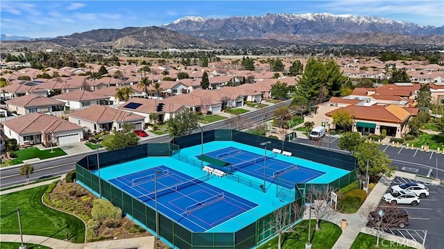 aerial view featuring a mountain view and a residential view