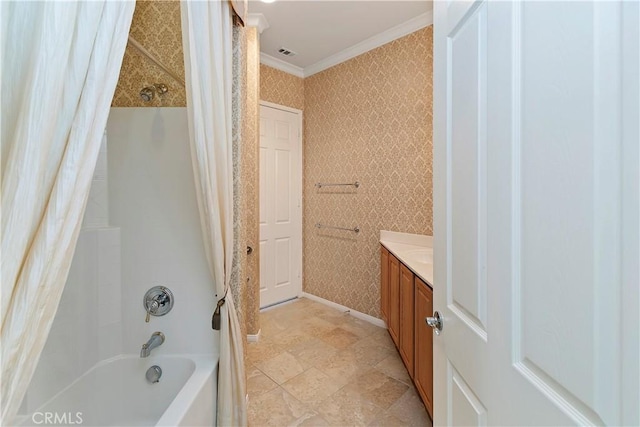 full bath with wallpapered walls, crown molding, baseboards, shower / tub combo, and vanity