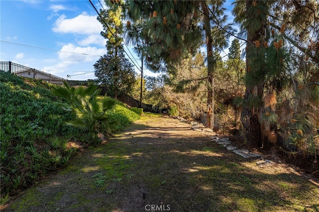 view of yard featuring fence