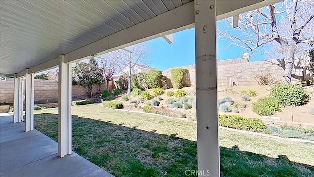 view of yard with a patio and a fenced backyard