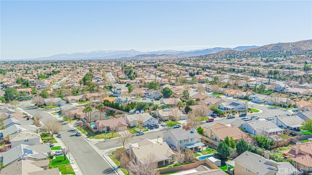 drone / aerial view with a mountain view and a residential view