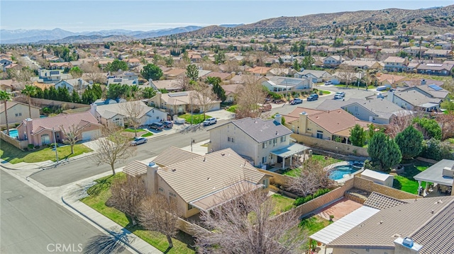 bird's eye view with a mountain view and a residential view