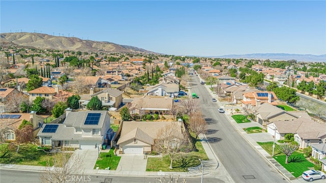 bird's eye view featuring a mountain view and a residential view