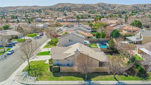 bird's eye view featuring a mountain view and a residential view