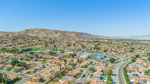 aerial view with a mountain view and a residential view